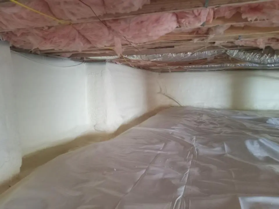 Crawl space encapsulation with closed-cell spray foam for Commercial Roof Restoration in North Arlington